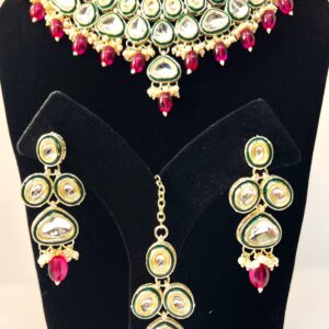 TB Kundan jadau set with Green border Meenakari and fine cut cabochons