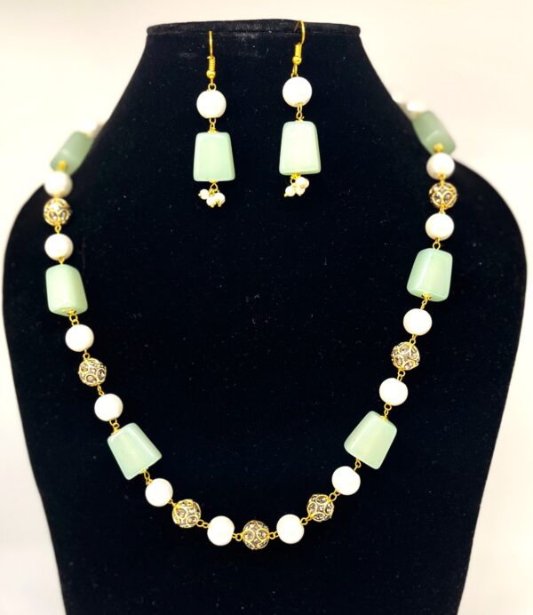 TB pearl strings set with Sea Green natural stone and studded gold bids - Image 3