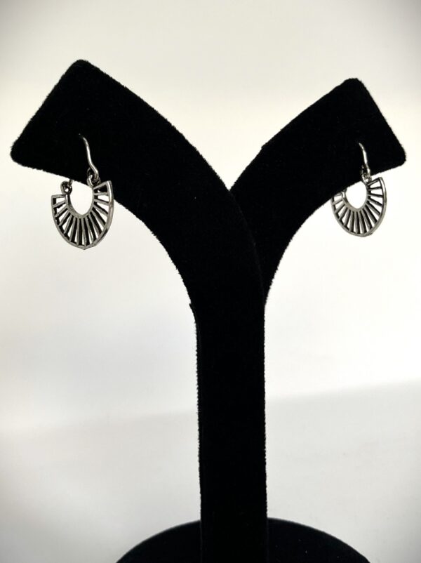 TB simple, elegent and stylish silver replica earring
