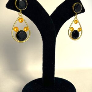 TB golden danglers with black stone designer piece on brass setting